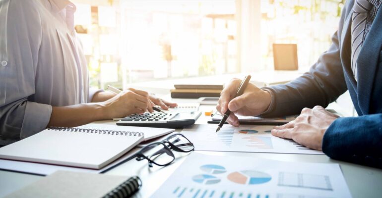 business man financial inspector and secretary making report, ca