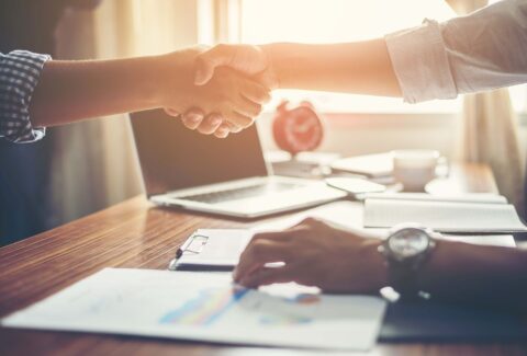 Business People Handshake Greeting Deal at work.